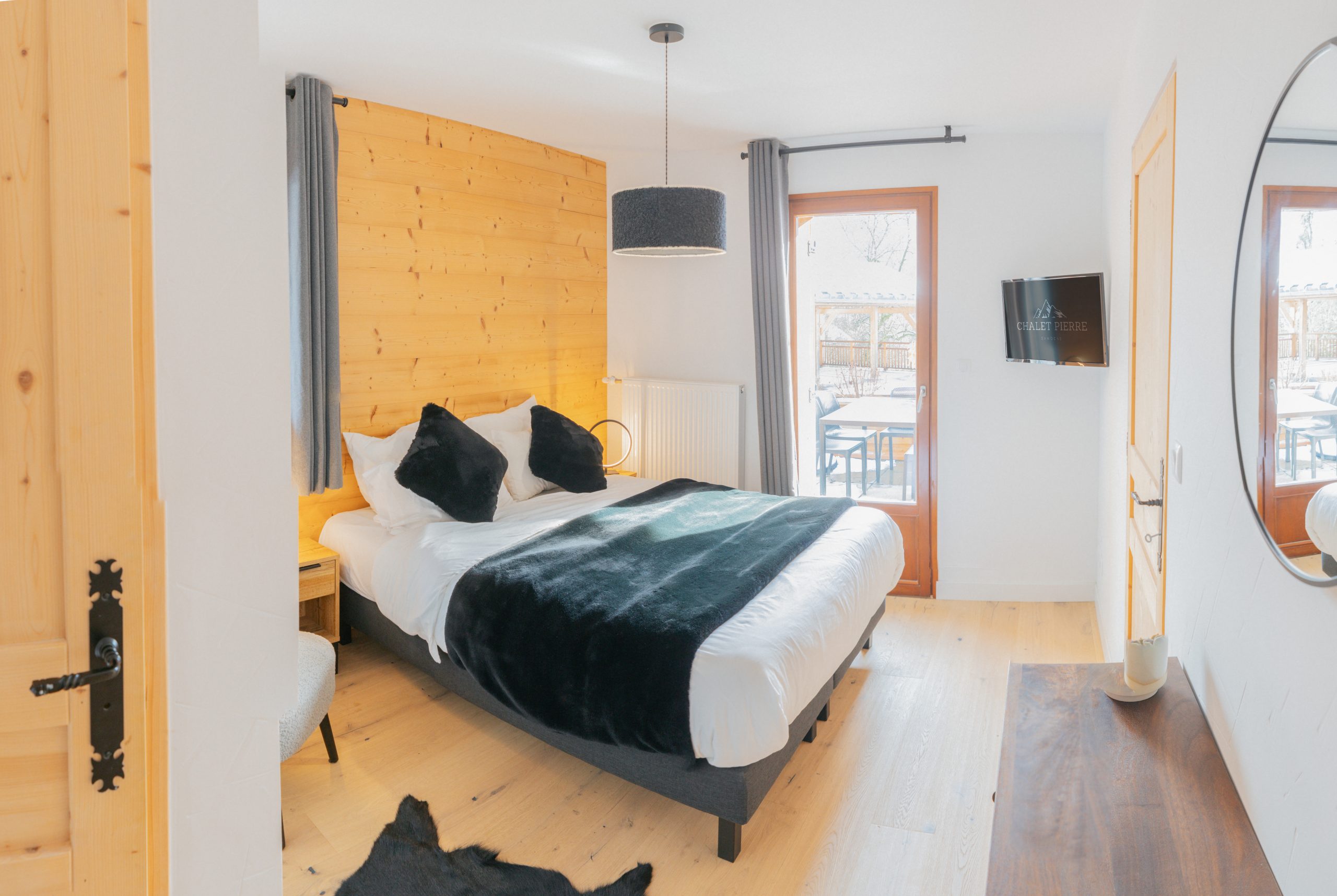 Chalet Pierre master bedroom with mountain views